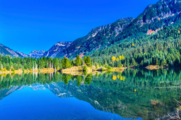 istock Gold Lake Reflection Mt Chikamin Peak Snoqualme Pass Washington 873134190