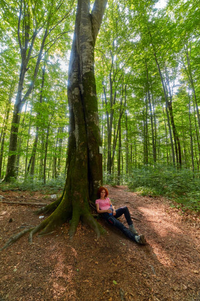istock Woman resting after a long hike 873140566