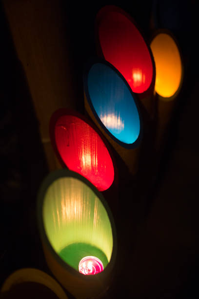 Candle lights in multi colorful bamboo tubes