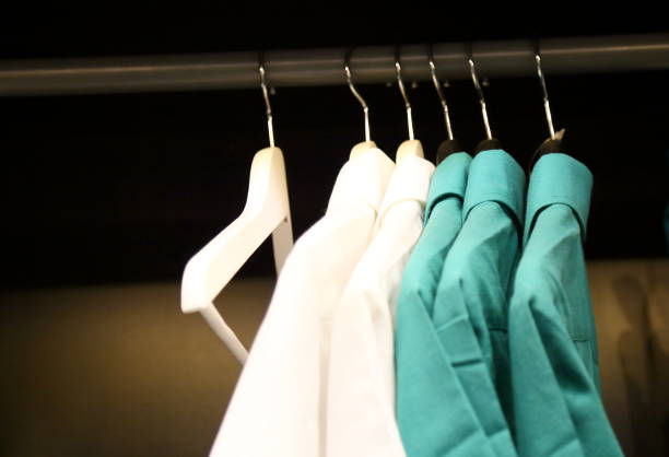 man's shirts in cabinet stock photo