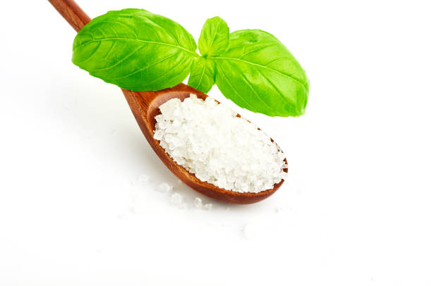 istock coarse sea salt on white background 873156974