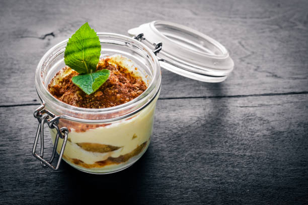 istock Tiramisu On a wooden background. Top view. Free space for your text. 873161808