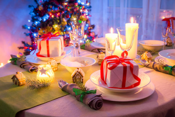 istock Family Christmas table setting for Christmas in evening 873164242