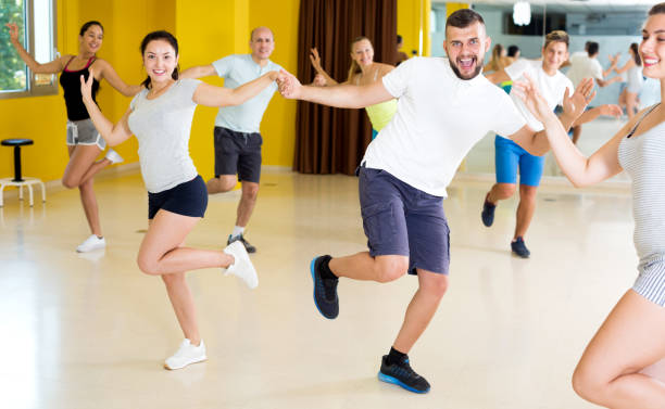 istock People dancing rock-and-roll in the hall 873164452