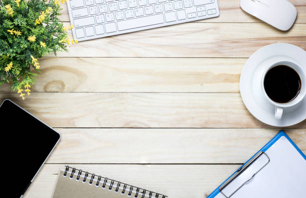 istock wood background with notebook  and coffee and seo object tools on copy space 873165508