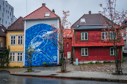 Bergen: Large blue bird graffiti art on the wall of a home in Bergen, Norway