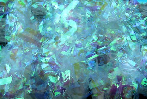 istock Abstract shiny plastic ribbon tassel background 873168682
