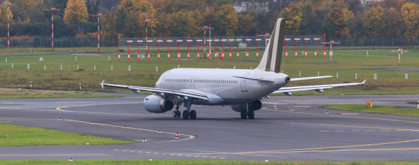 istock airplane at an airport runway 873168954