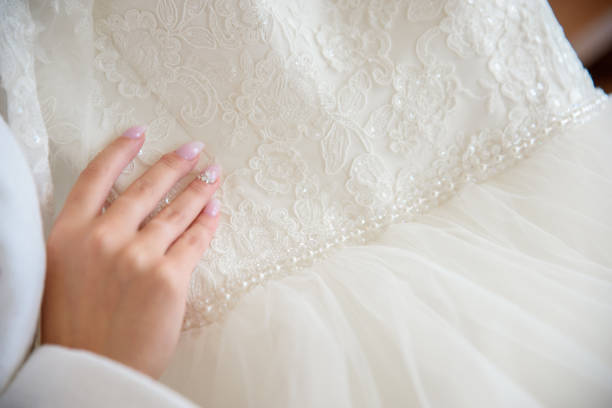 istock Crop bride with beautiful dress 873176726