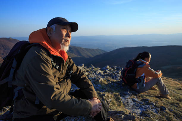 istock Father and daughter exploring the mountains 873178524