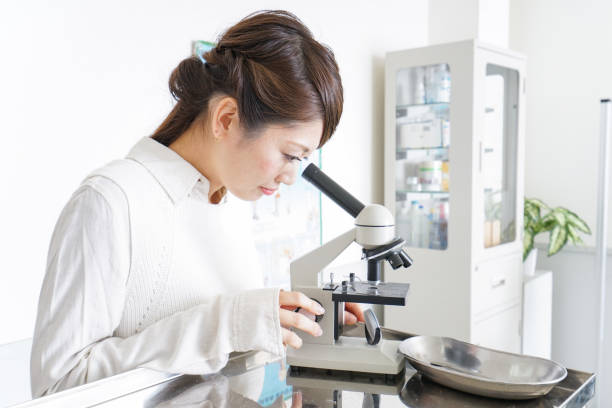 istock researching young woman 873184076