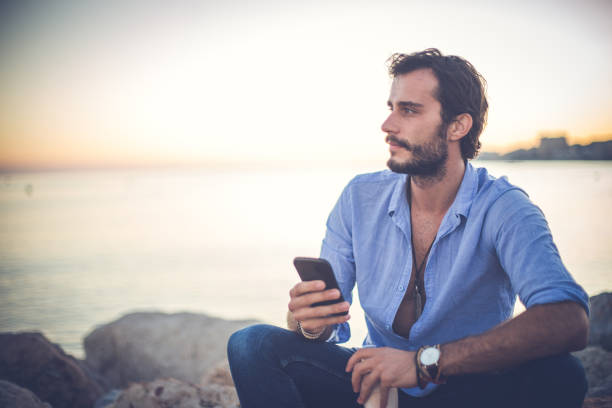 istock Enjoying coffee by the water 873187064