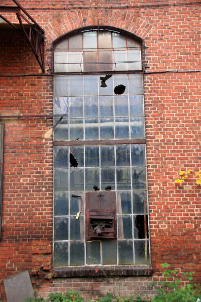 istock Window in a brick wall of bricks 873187988