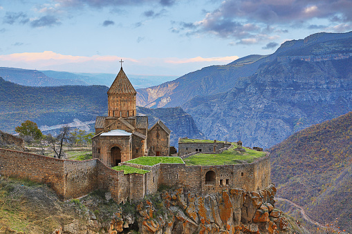 View over the Tatev cathedral and church complex near the city of Goris, in Armenia, at the sunset.