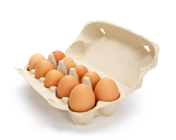 istock Ten brown eggs in a carton package, contains clipping path 873188612