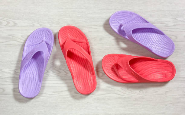 istock Red and Purple Flip Flops 873195098