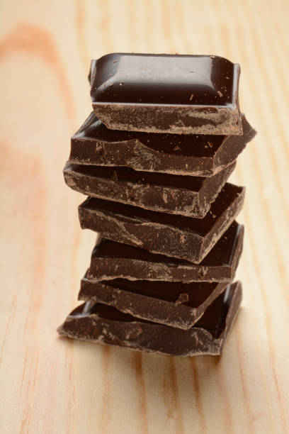 istock Chocolate on wooden background 873196056