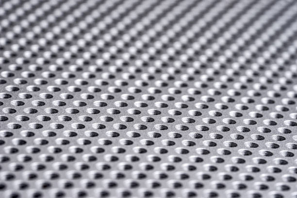 istock Holes in Metal Macro Background 873197146
