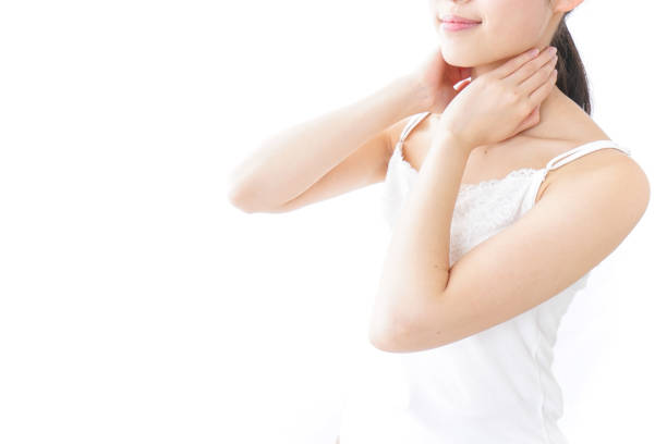 istock young woman applying a cream 873200636