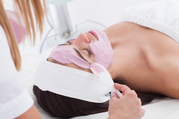 istock Woman is spa with mask on her face. 873214892