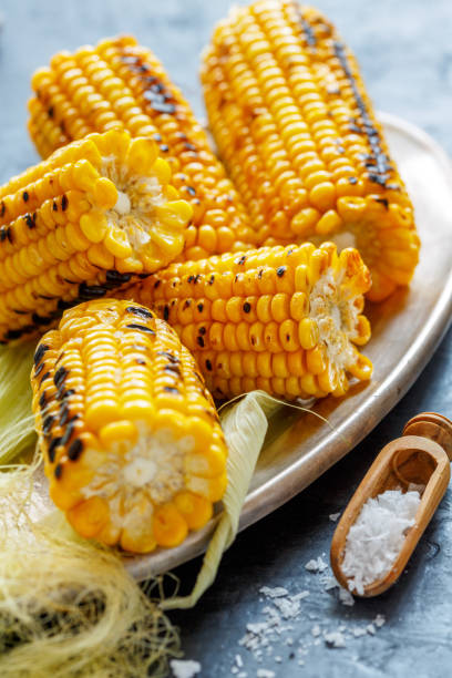 istock Sweet corn grilled with sea salt. 873226682