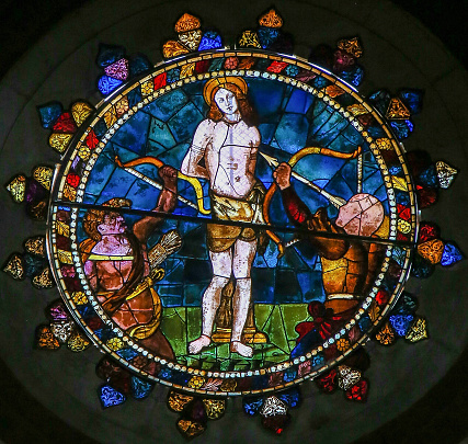 Stained Glass in the Basilica of San Petronio, Bologna, Emilia Romagna, Italy, depicting the Martyrdom of Saint Sebastian