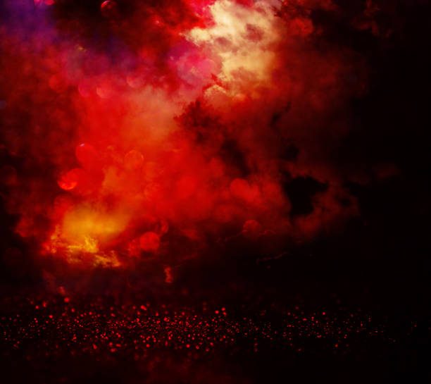 istock black and red glitter lights background. defocused 873226962