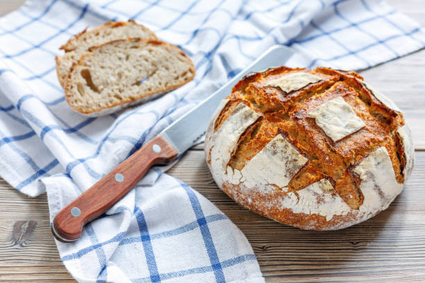 istock Fresh homemade sourdough bread from wheat and rye. 873227094