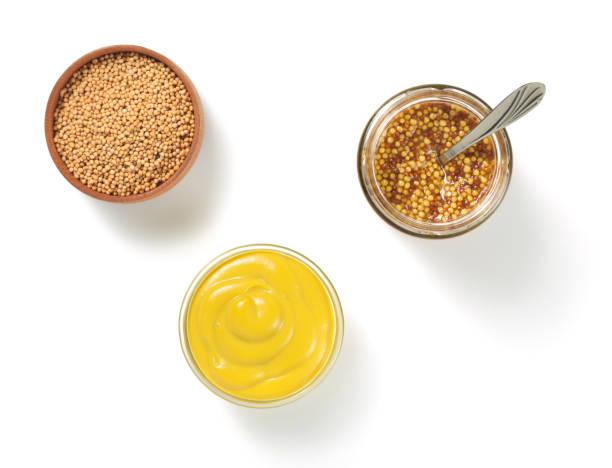 istock mustard sauce in bowl isolated on white 873235666