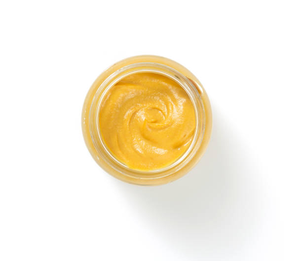 istock mustard sauce in bowl isolated on white 873235686