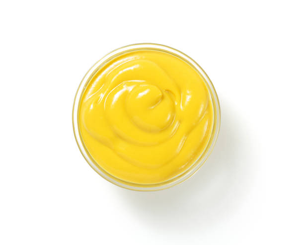 istock mustard sauce in bowl isolated on white 873235692