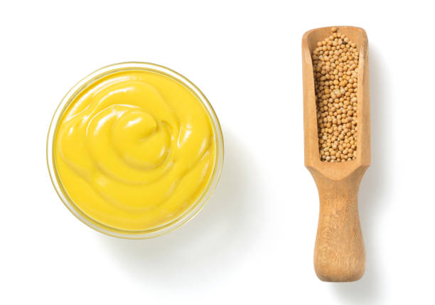 istock mustard sauce in bowl isolated on white 873235732