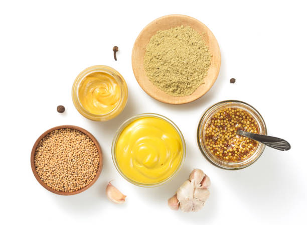 istock mustard sauce in bowl isolated on white 873235736