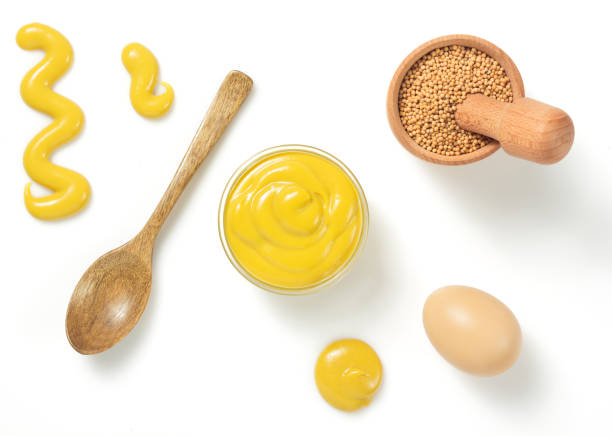 istock mustard sauce in bowl isolated on white 873235744