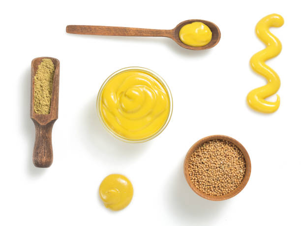mustard sauce in bowl isolated on white