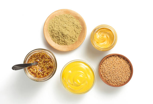 istock mustard sauce in bowl isolated on white 873235782