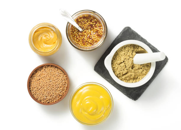 istock mustard sauce in bowl isolated on white 873235790