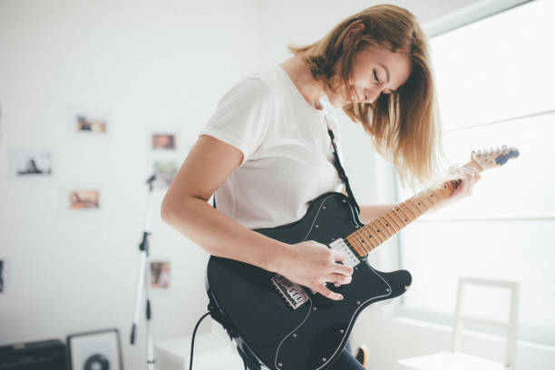 istock In love with my new guitar 873243106