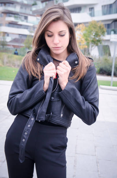 istock Shy girl wearing black clothes 873249600
