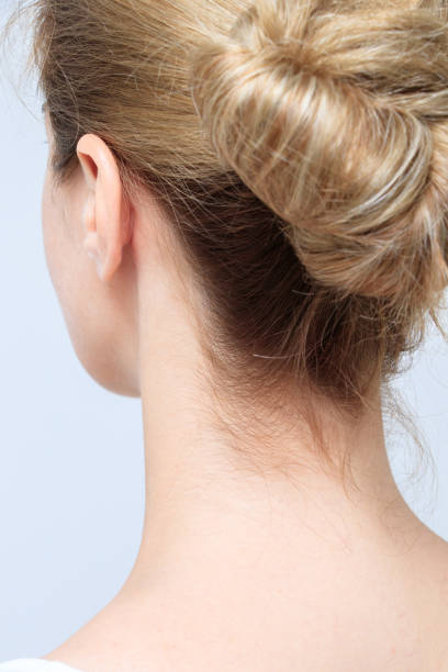 istock Nape of a young woman's neck 873252310