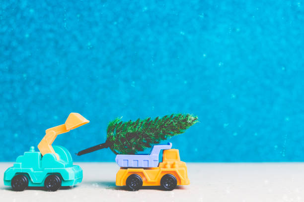 istock Christmas tree on miniature car. Christmas seasons celebration concept 873252566