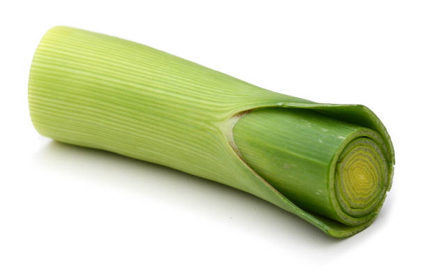 istock Ripe fresh leek isolated on white background. Food ingredients 873253132