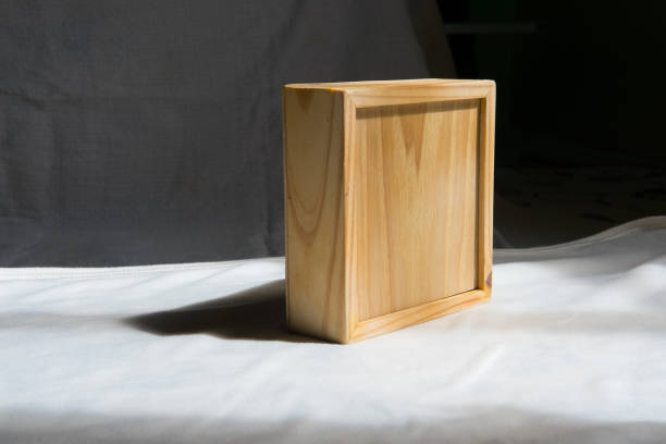 istock Wooden box on white cloth 873256524