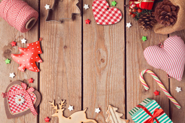istock Christmas background with rustic Christmas decorations on wooden table. View from above 873256572