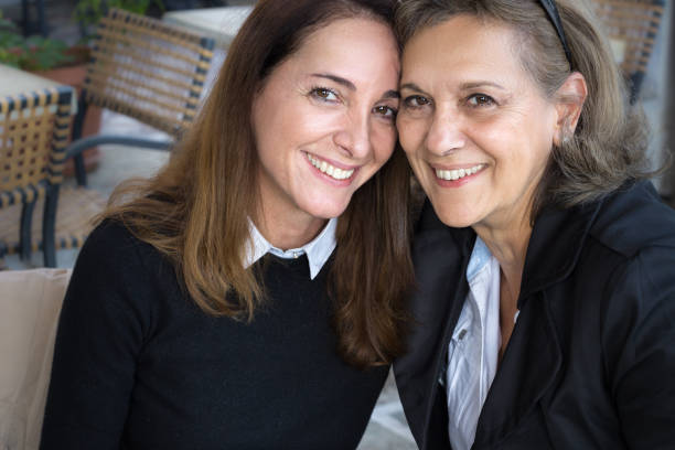 istock Portrait of two women front view. 873260258