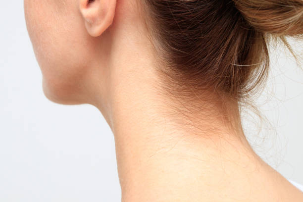 Nape of a young woman's neck stock photo