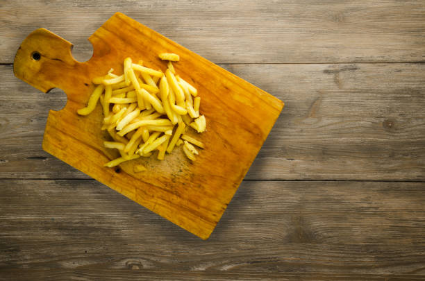 istock fry potatoes on a wooden background 873267644
