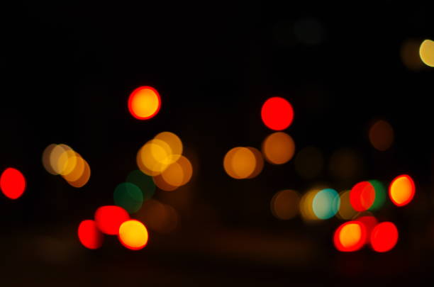 istock Night city street lights bokeh background 873270588