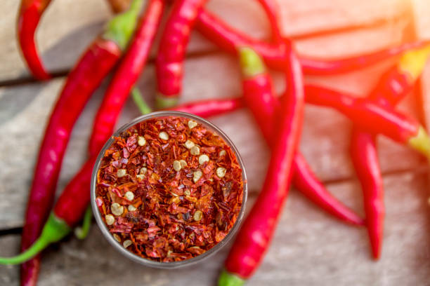 istock Red Pepper Flakes and red Chili 873275010