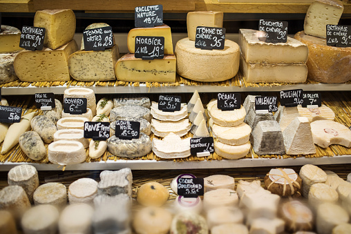 Paris, France: Different type of cheese in a store.
